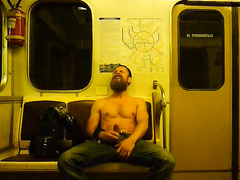 Bearded Russian guy rubs his big dick on the subway