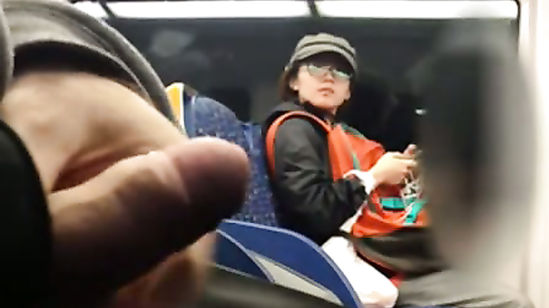 Asian woman sees him stroking on the train