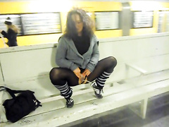 German girlfriend in pantyhose pees at a public train station