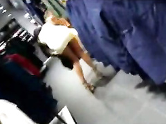 Fashionable girl shops in slutty dress as I film her ass
