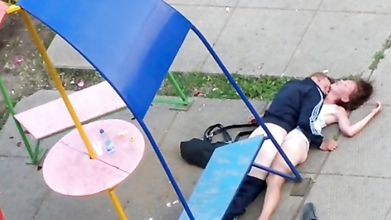 Crazy homeless couple has public sex in a park voyeurstyle photo