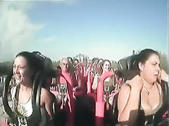 Big tits pop out on roller coaster cam