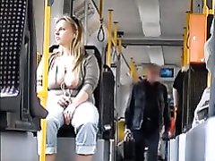 Chubby girl has her big tits out on the bus