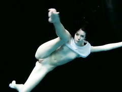 Flexible young swimmer in solo underwater video