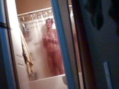 Chubby amateur gets clean in voyeur shower video