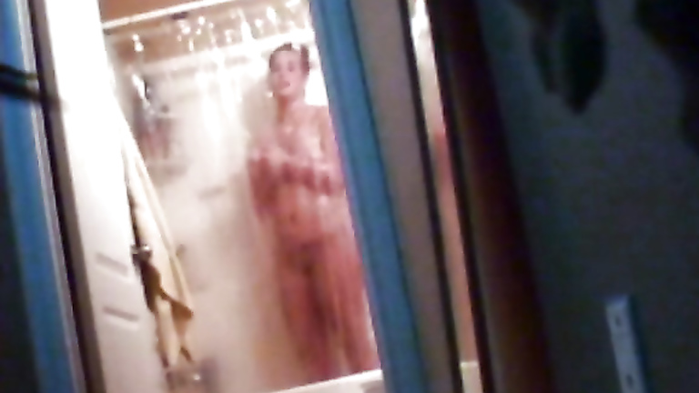 Chubby amateur gets clean in voyeur shower video