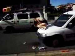Swimsuit girlfriend pissing on the hood of a car