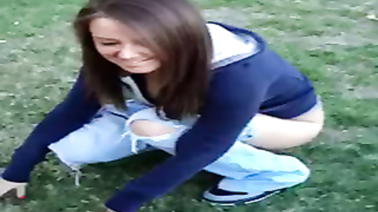 Friends piss on the grass and film it