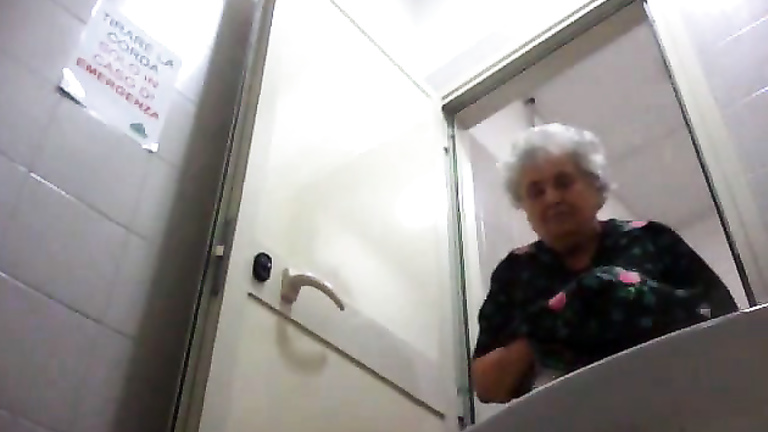 Granny pussy pees in restroom spy camera film voyeurstyle