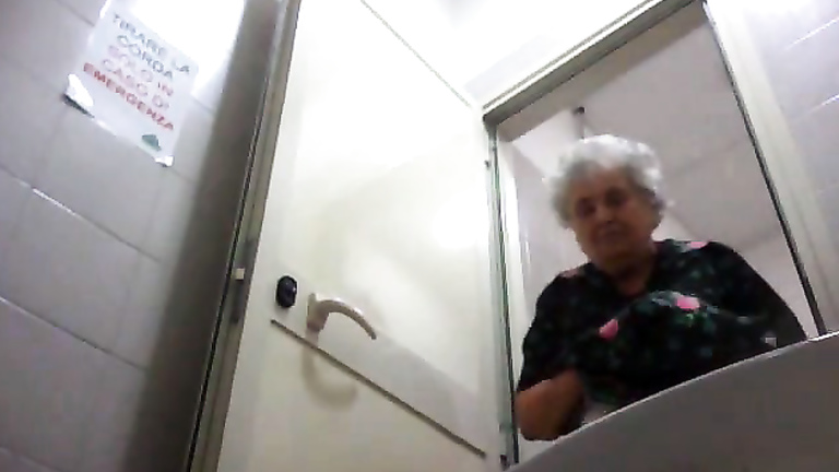 Granny pussy pees in restroom spy camera film