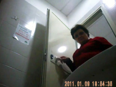 Granny peeing in public toilet on hidden camera movie