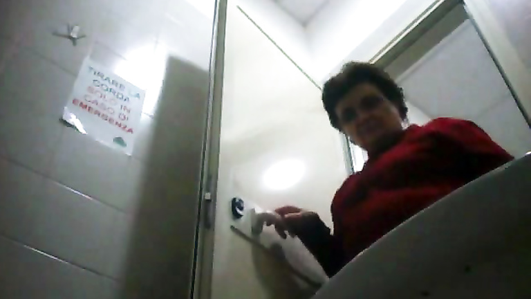Granny peeing in public toilet on hidden camera movie