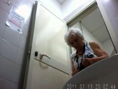 Charming granny in pantyhose pisses and wipes clean