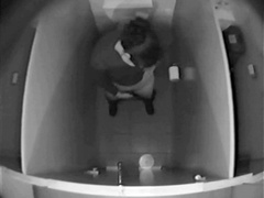 College girl examines her pussy in toilet hidden camera footage