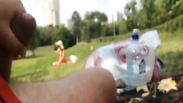 Stroking my dick to a bikini girl in the park