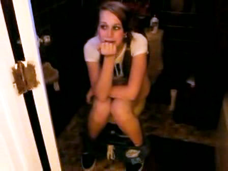 Teen girl filmed sitting on the toilet and peeing voyeurstyle