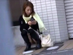 Japanese girl sexy upskirt on public sidewalk