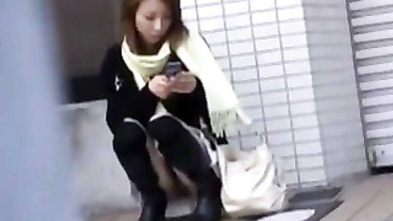 Kinky Japanese babe shows her cunt in public