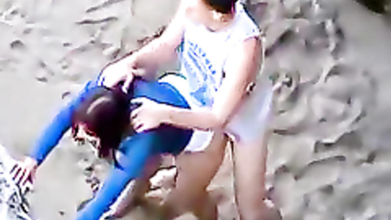 Hot young brunette fucked at the beach