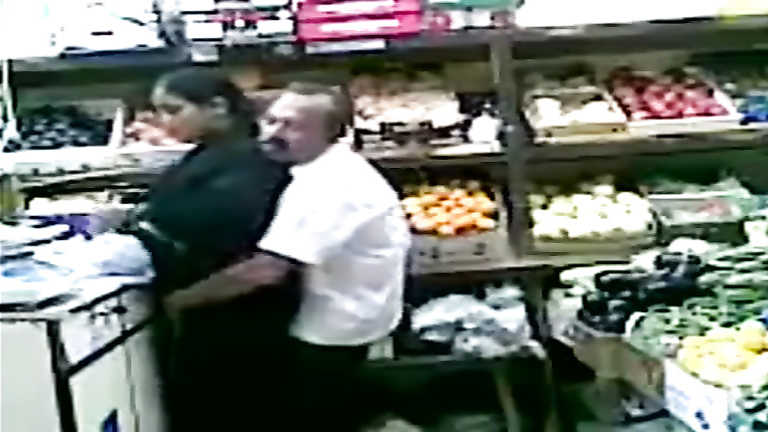 Grocer bangs his Pakistani wife from behind in the store voyeurstyle