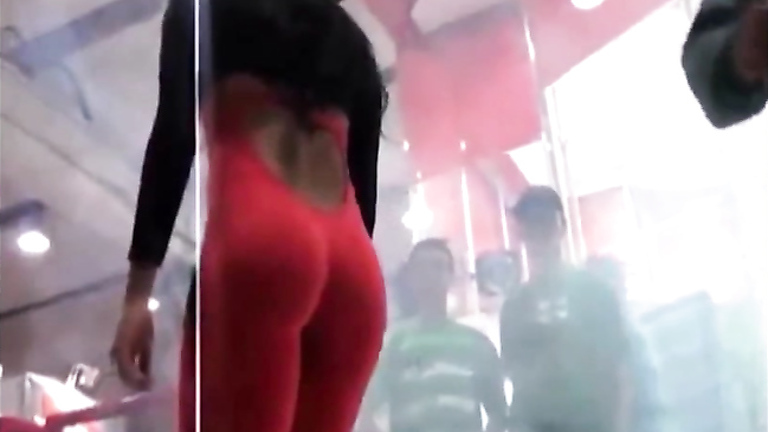 Hot model in tight red suit mingles with the crowd at the club