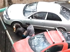 Dirty hooker gets nailed while hiding between two cars