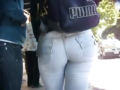 Beautiful young lady with a huge ass is wearing tight jeans