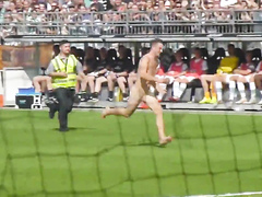 Nude maniac runs around the football field