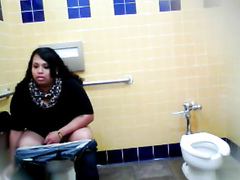 Lovely Brazilian fattie gets recorded urinating hard in a public restroom