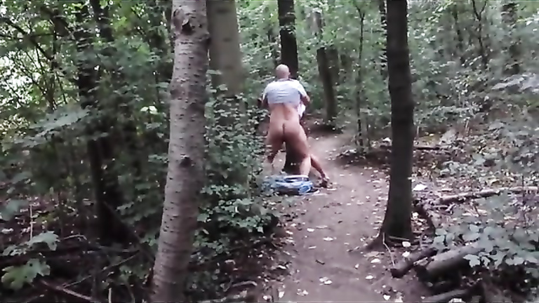 Mature couple enjoys fumbling really hard in the forest