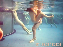 Naughty nudists enjoy banging hard underwater in the pool