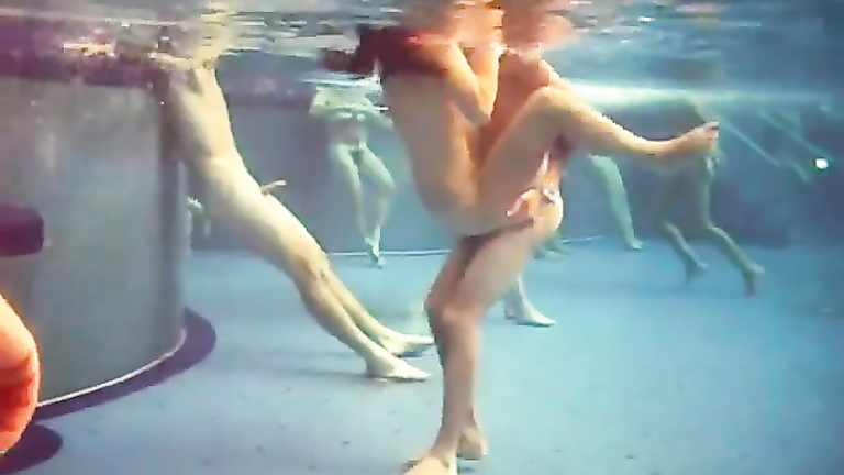Naughty nudists enjoy banging hard underwater in the pool
