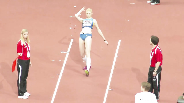 Russian sportswoman enters a long jump competition