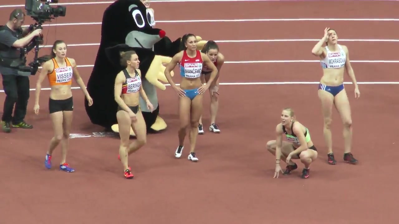 Athletic women warm up before a long race voyeurstyle photo