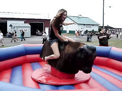 Bull ride uncovers the girl's pussy
