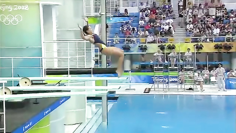 Water-jumping girl unintentionally shows her boob