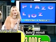 Smoking hot Italian blonde teases with her tits live on TV