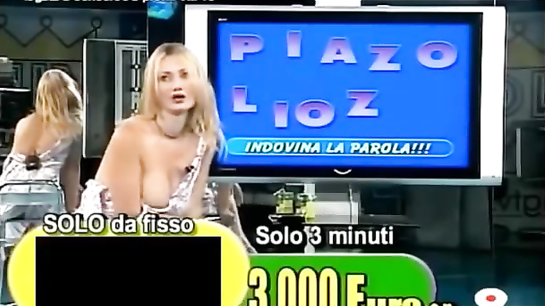 Smoking hot Italian blonde teases with her tits live on TV