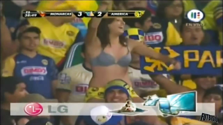 Curvy fangirl shows off her boobs on the football match