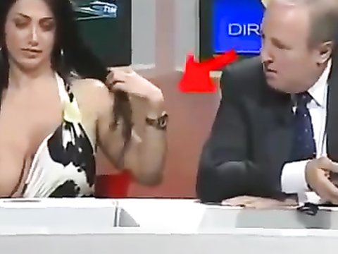 Famous Italian TV host with large boobs desperately tries to keep them in  her dress | voyeurstyle.com