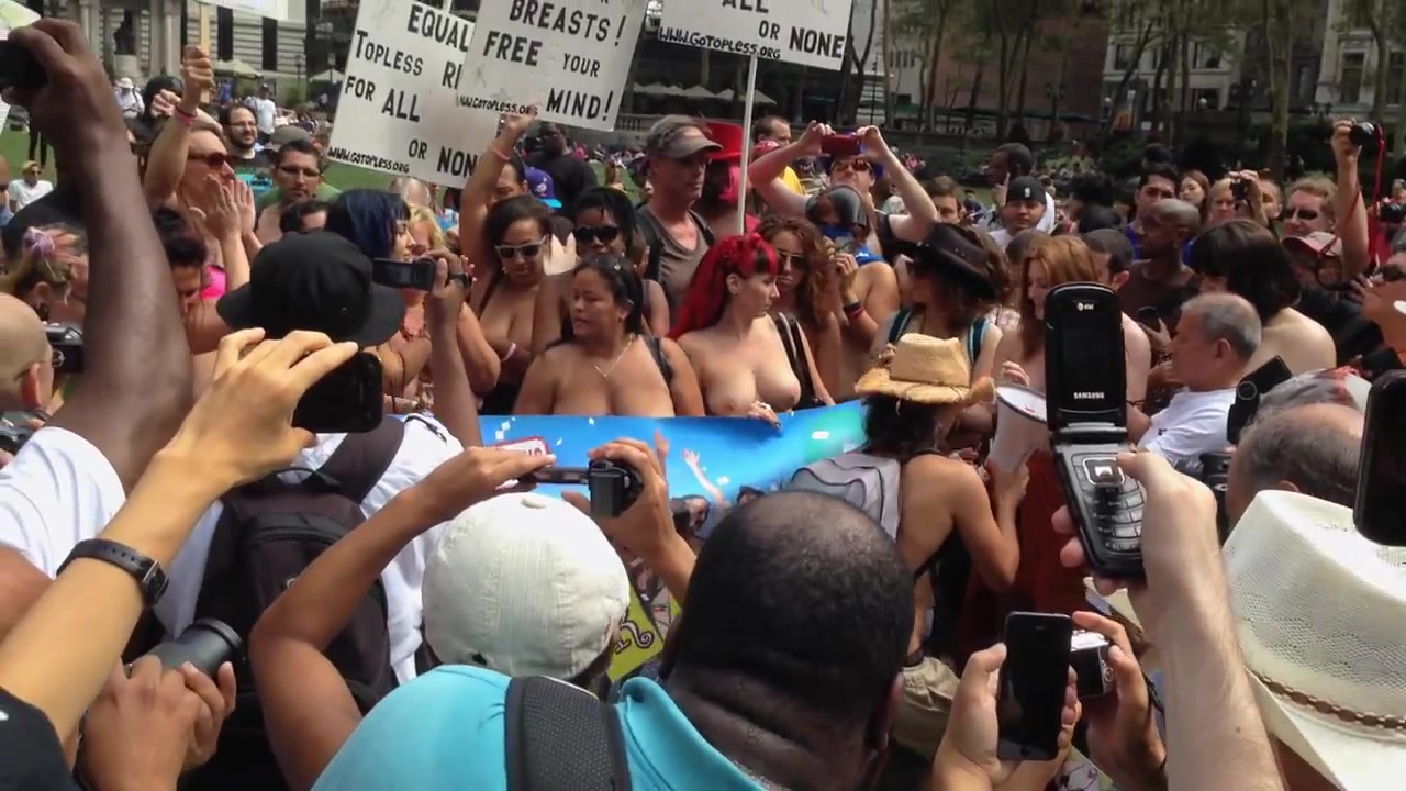 Busty American women doing the nude protest for equality voyeurstyle