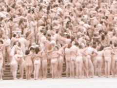 Thousands of people pose completely naked for an art creation