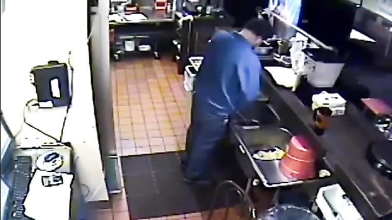 Nasty employee takes a pee into the sink