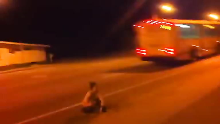 Graceful brunette takes a leak on the highway