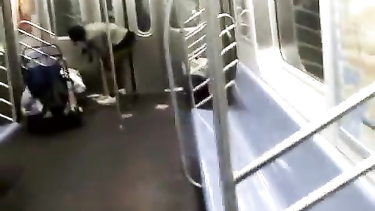 Nasty homeless woman takes a piss inside the train
