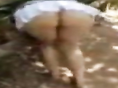 My chubby GF bends over and reveals her big butt