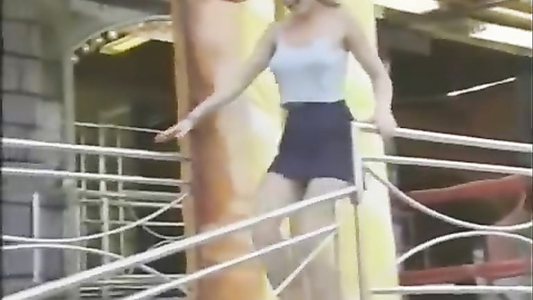 Gust of air picks up a delicious blonde's blue dress