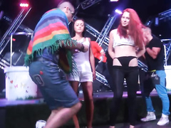 Bombastic girls pull up their thongs on the stage