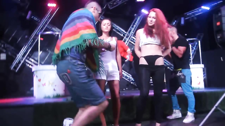 Bombastic girls pull up their thongs on the stage
