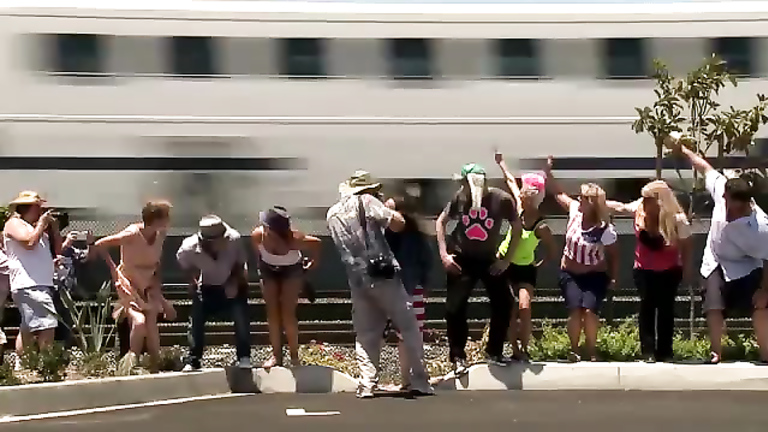 Crazy people flashing their butts to the train